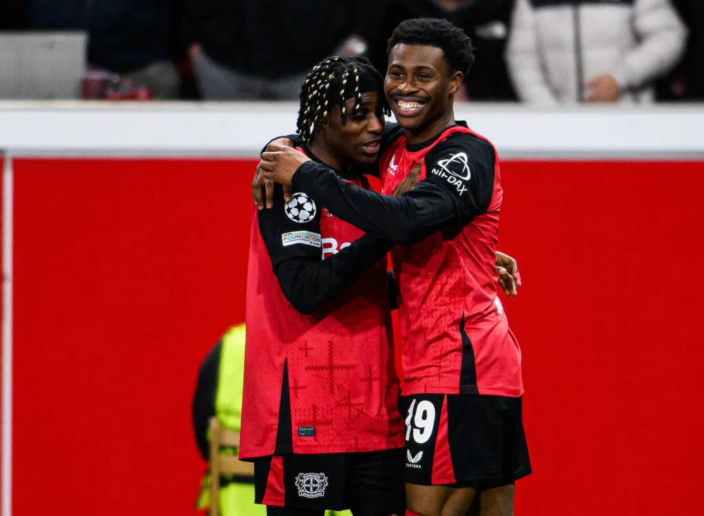 Nathan Tella celebrating first Champions League goal with teammate