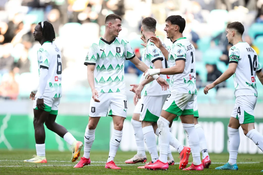 Peter Agba with teammates