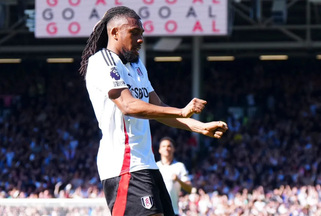 Alex Iwobi celebrating his goal and assist against Liverpool