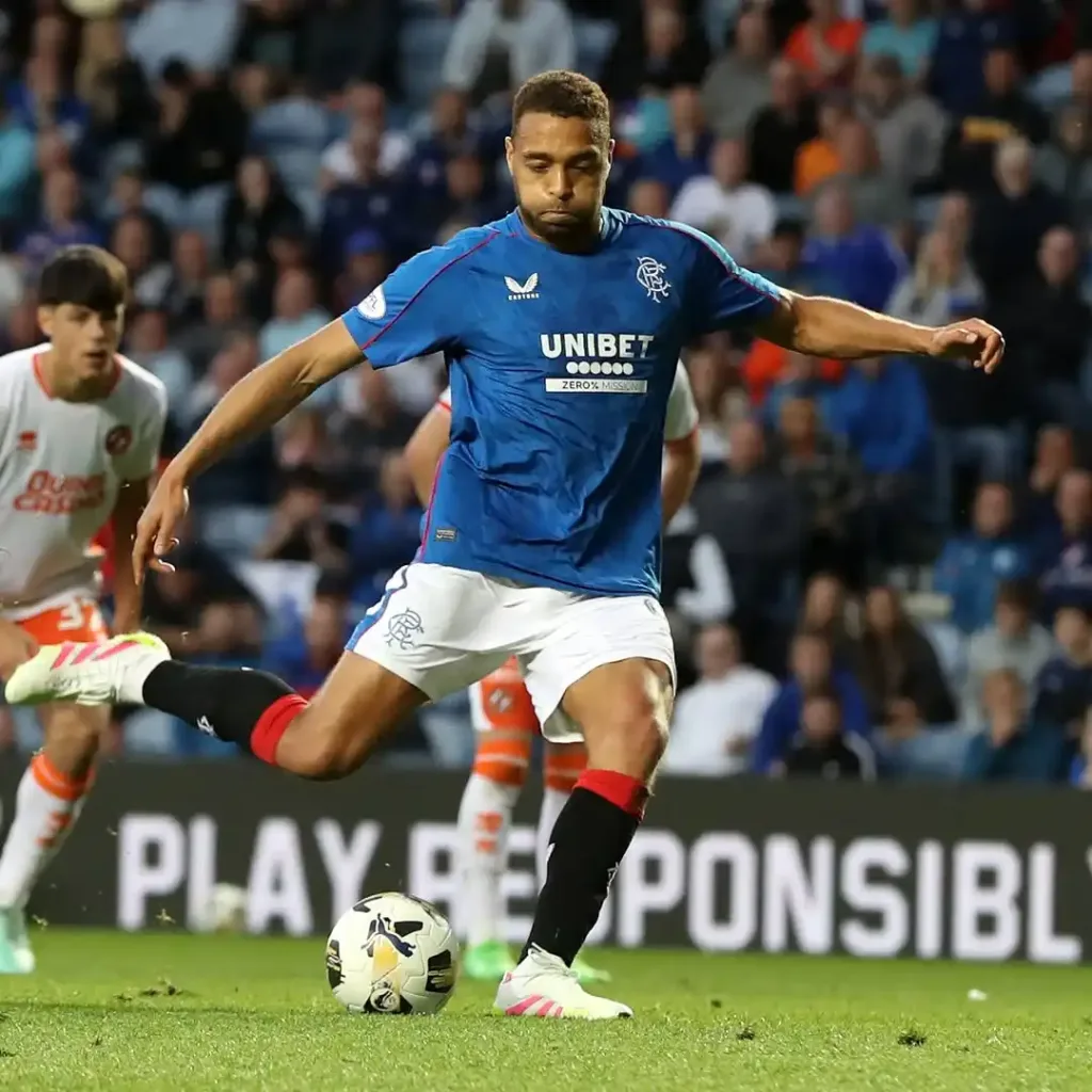 Cyriel Dessers scores from spot kick