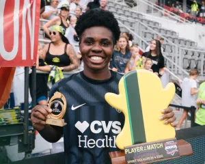 Gift Monday with her player of the match award