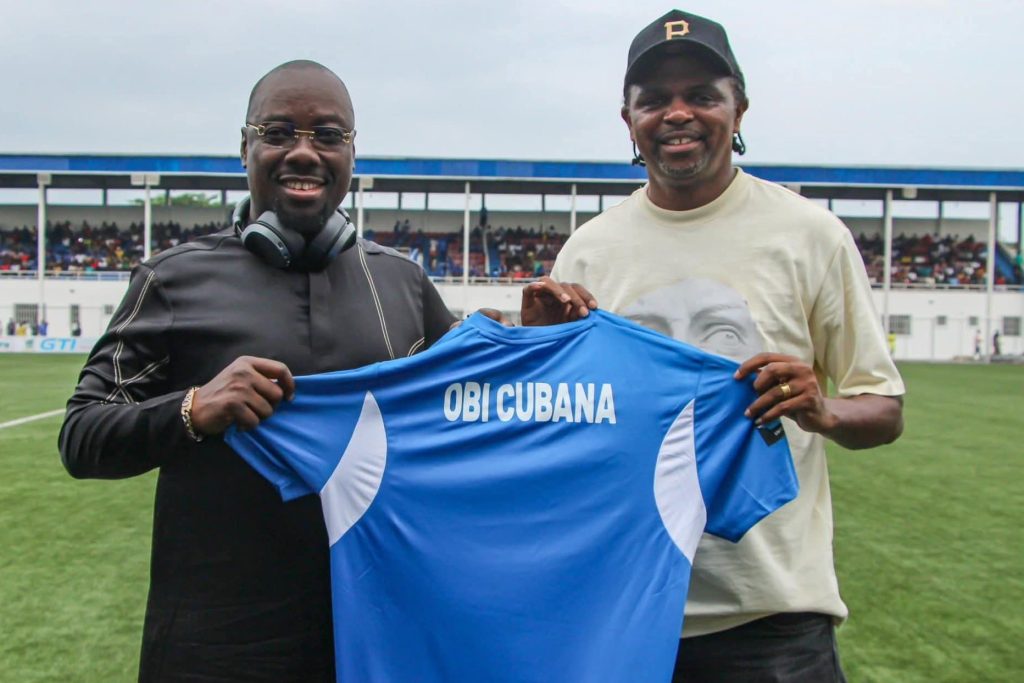 Obi Cubana in customized Enyimba jersey Aba