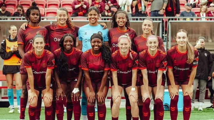 Esther Okoronkwo celebrating with teammates after victory