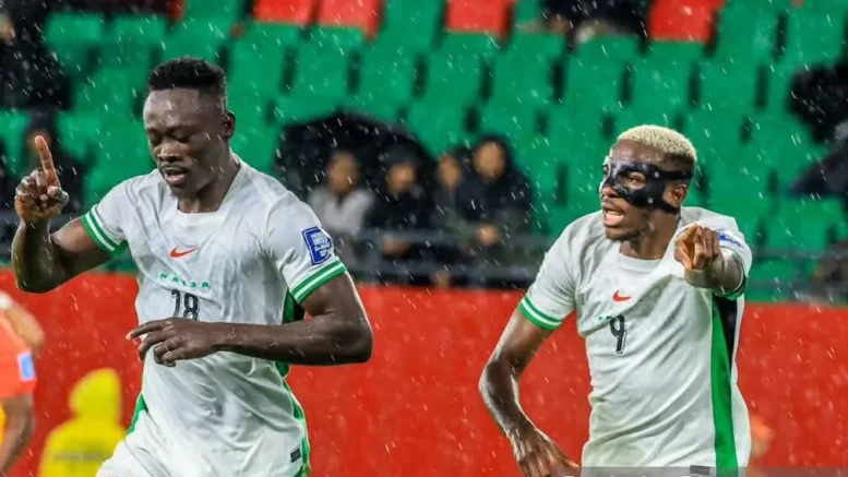 Chidera Ejuke and Wilfred Ndidi celebrate Sevilla star’s first goal for Nigeria in extra-time win over Gabon