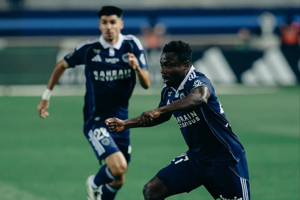 Moses Simon celebrates scoring for Paris FC against Monaco
