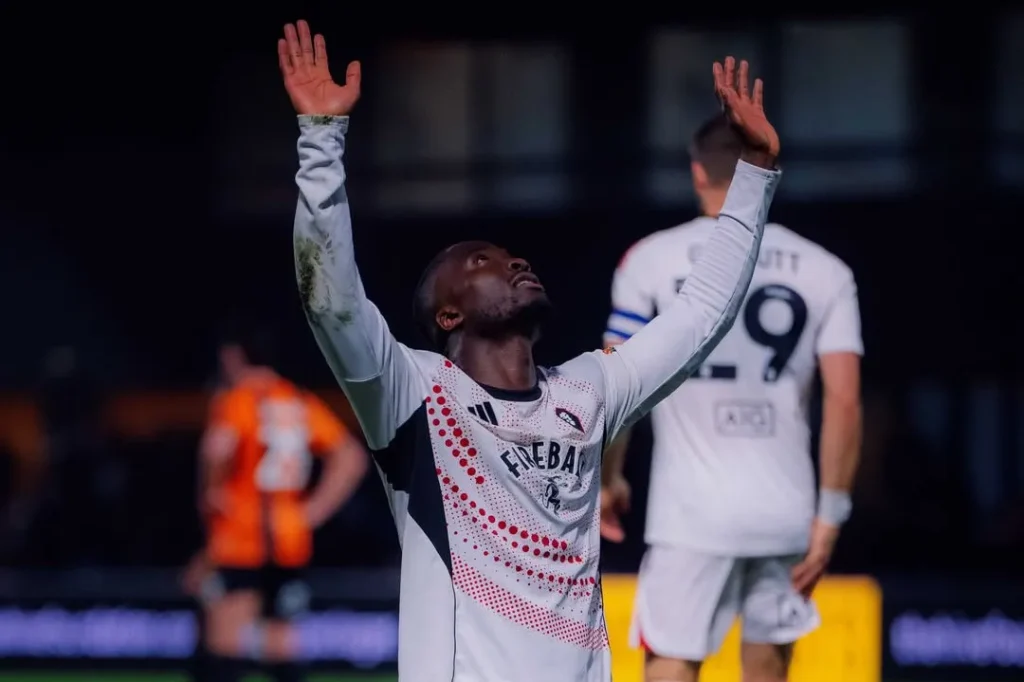 Daniel Udoh celebrating his goal for Salford City