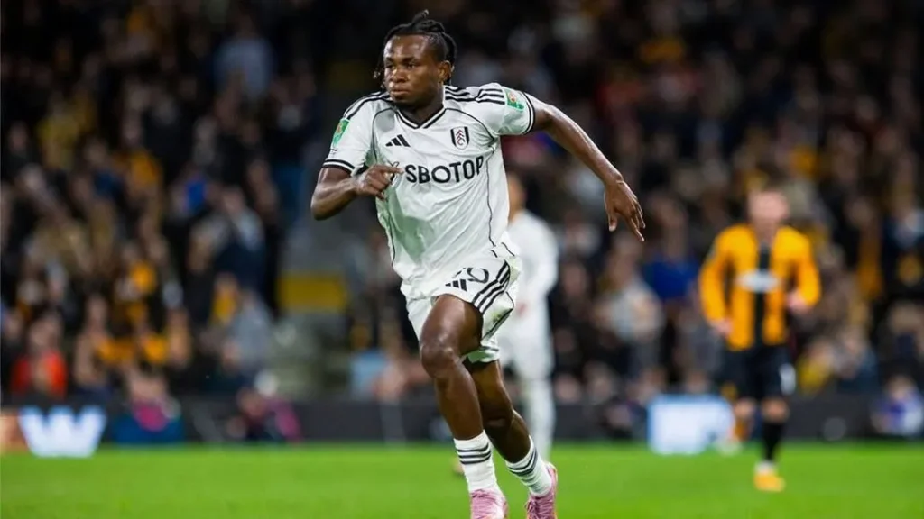 Samuel Chukwueze warming up at Craven Cottage