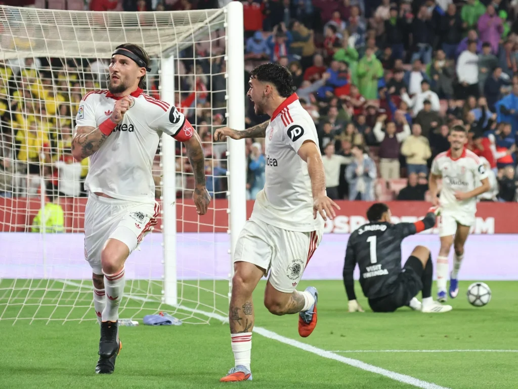 Ademola Lookman and Akor Adams sharing a moment on the pitch