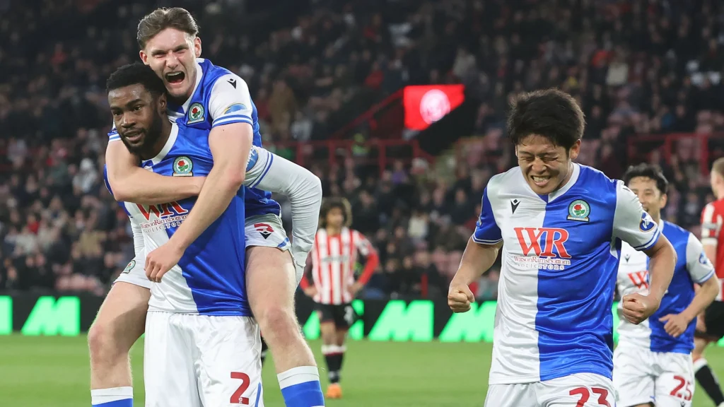 Blackburn Rovers players celebrating Championship survival after beating Sheffield United