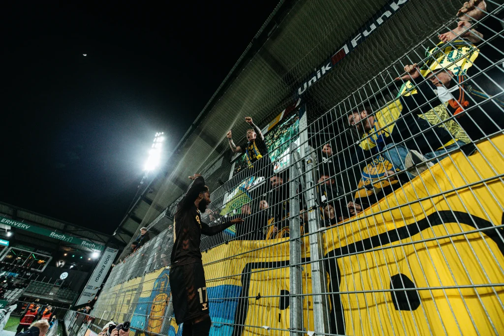 Emmanuel Dennis striking the winning ball against Viborg FF