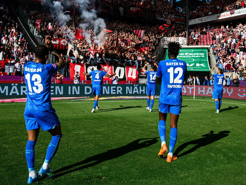 Nathan Tella celebrates assist in Leverkusen derby win